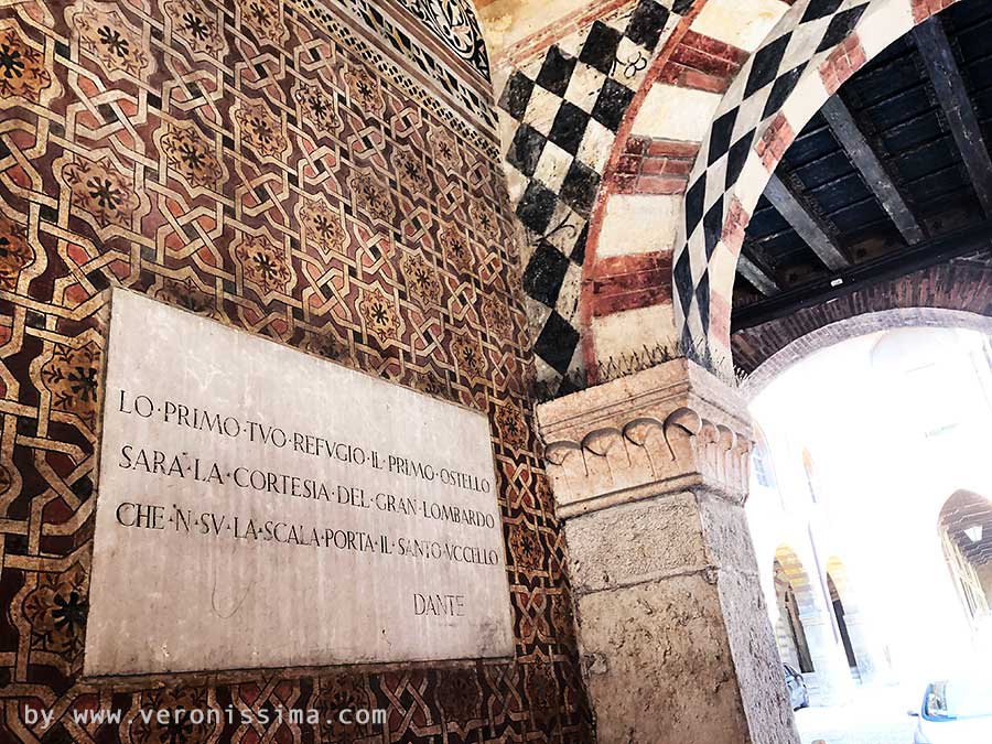 Marble inscription with Dante's verses inside the old Scala family residence