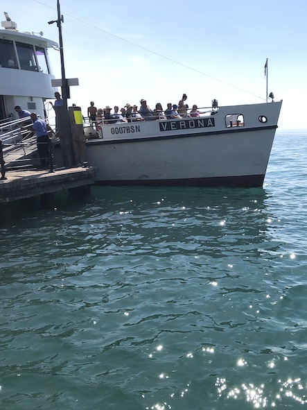 Boat with passengers on lake Garda