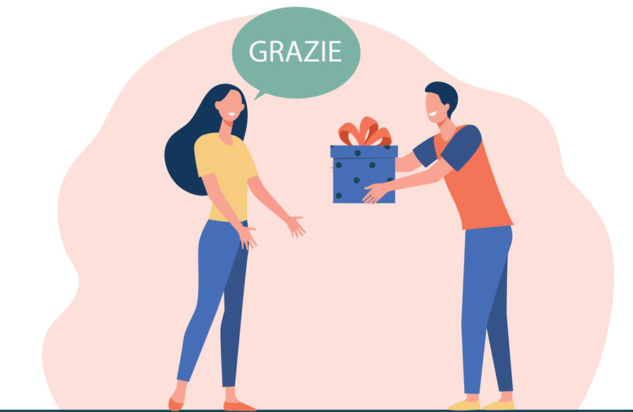 a person receiving a present and saying thank you in Italian