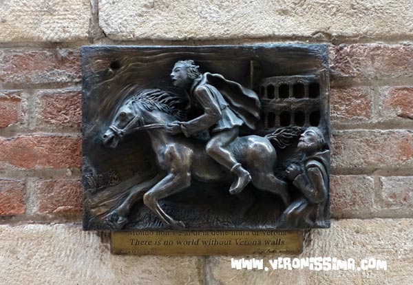 bronze bas-relief showing Romeo fleeing from Verona on a horse