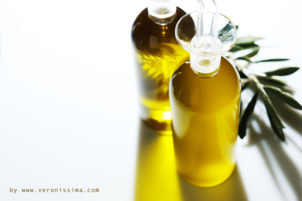 two bottles of extra virgin olive oil