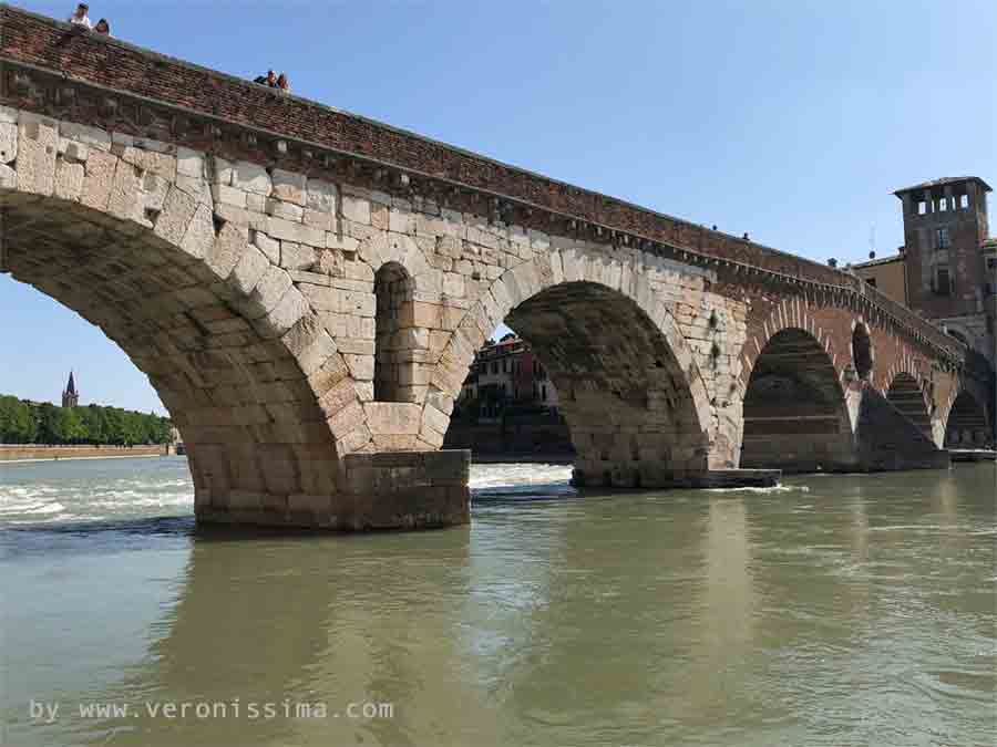Ponte Pietra seen from Adige river