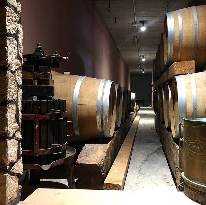 Barrels in the wine aging cellar