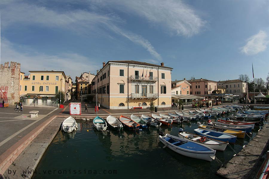 Bardolino harbour with the town hall and the middle age tower