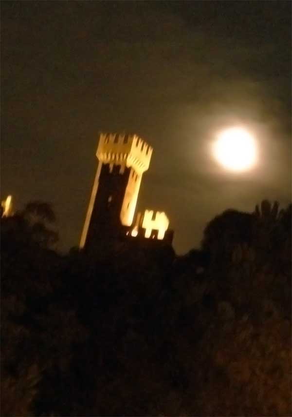 Night picture of Valeggio's castle with full moon