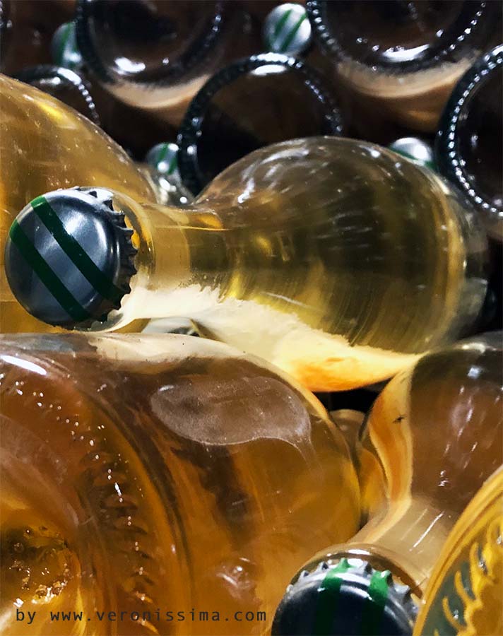 bottles stacked with yeast inside for the second fermentation